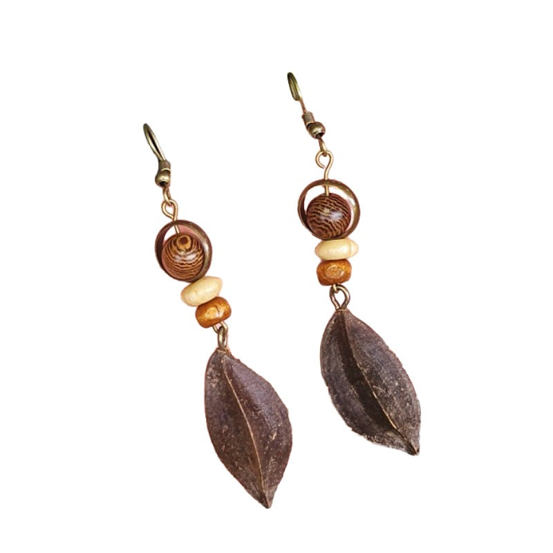 Handmade retro Mori dried fruit simple personality design models mahogany long hollow round wooden beads female earrings earrings