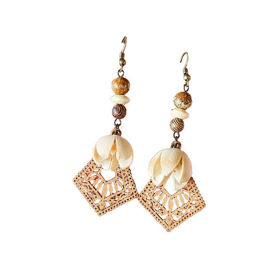National style retro niche Mori bohemian Indian wandering style hollowed out wood grain real dried fruit handmade earrings
